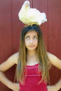 Girl with Chicken on her head